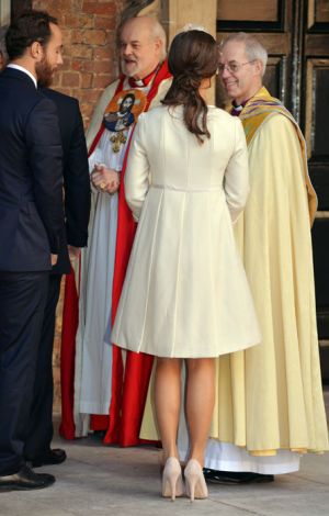 Pippa Middleton at Prince George christening in cream frockcoat.jpg